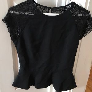 Black peplum with black Lacey back